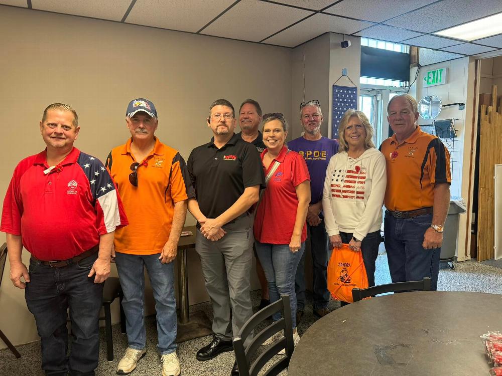 Elk members with Commander Preston Hard, VFW Kelly Ingram Post, Birmingham, AL.  Elk members used a portion of their Alabama Elks Trust Grant to purchase, cook and deliver hot dogs to the post for Veterans and Veterans Day parade participants to enjoy prior to the Annual Veterans Day Parade.
Pictured left to right - Bill Thrasher, DDGER, PER, Trustee, David Cain lodge member and Shriner, Preston Hard, Commander VFW, Mickey Drinkard, PDDGER, PER, Secretary, Donna Walters, lodge member, Curtis Walters, lodge member and Past Potentate Zamora Shrine, back row, Justin Rodgers, PER, Loyal Knight, and Donny Beard, Trustee.
