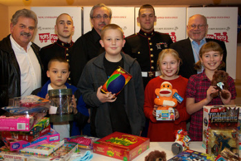 Trustee Nick Santora, Cpl Van Cleave USMC, Exalted Ruler Jim Schwichtenberg, Cpl Mahoney USMC, PER Bill McCabe also pictured: Nick’s Grandsons Remo & Dominic with Kem Baesman’s Children Sarah & Madison