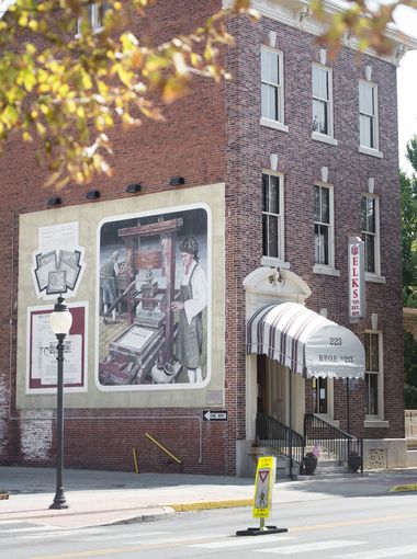 The mural on the side of the building honors York Elk, Rabbi & Military Chaplain Alexander D. Goode who went down with his transport ship, the Dorchester, in World War II when it was hit by a torpedo.  He heroically gave up his life jacket so that others might live. 