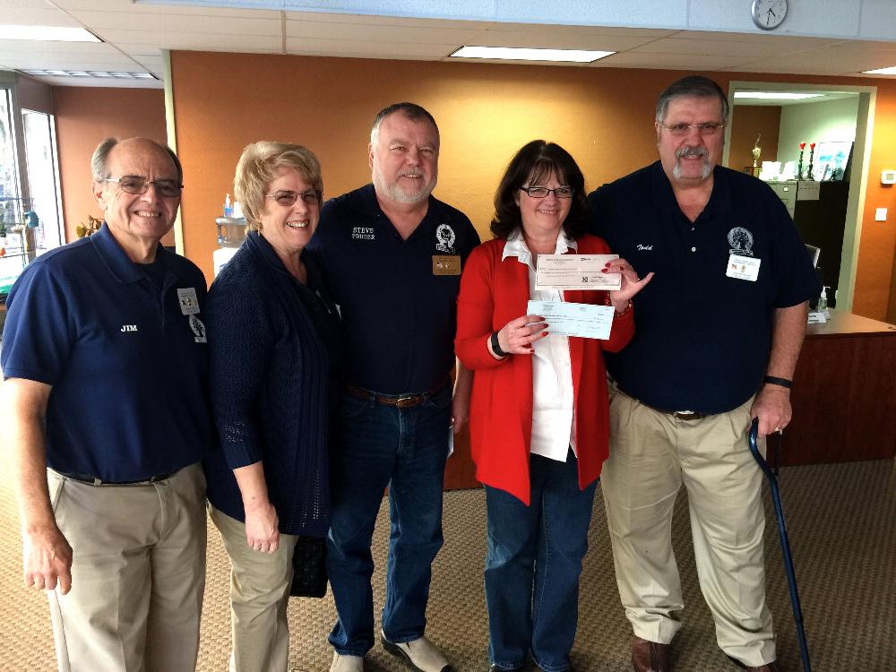 Presenting checks from Oregon State lodges for the UCC relief fund:  Leading Knight Jim Blasi, Trustee Glenda Martin, PER Steve Malone, United Way employee, Exalted Ruler Todd Lund