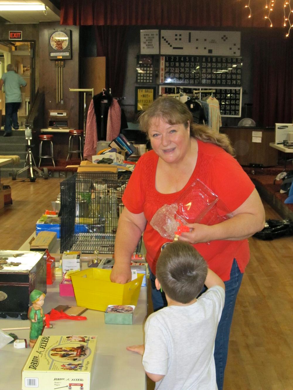 Joy Malone setting up the Elkette rummage sale