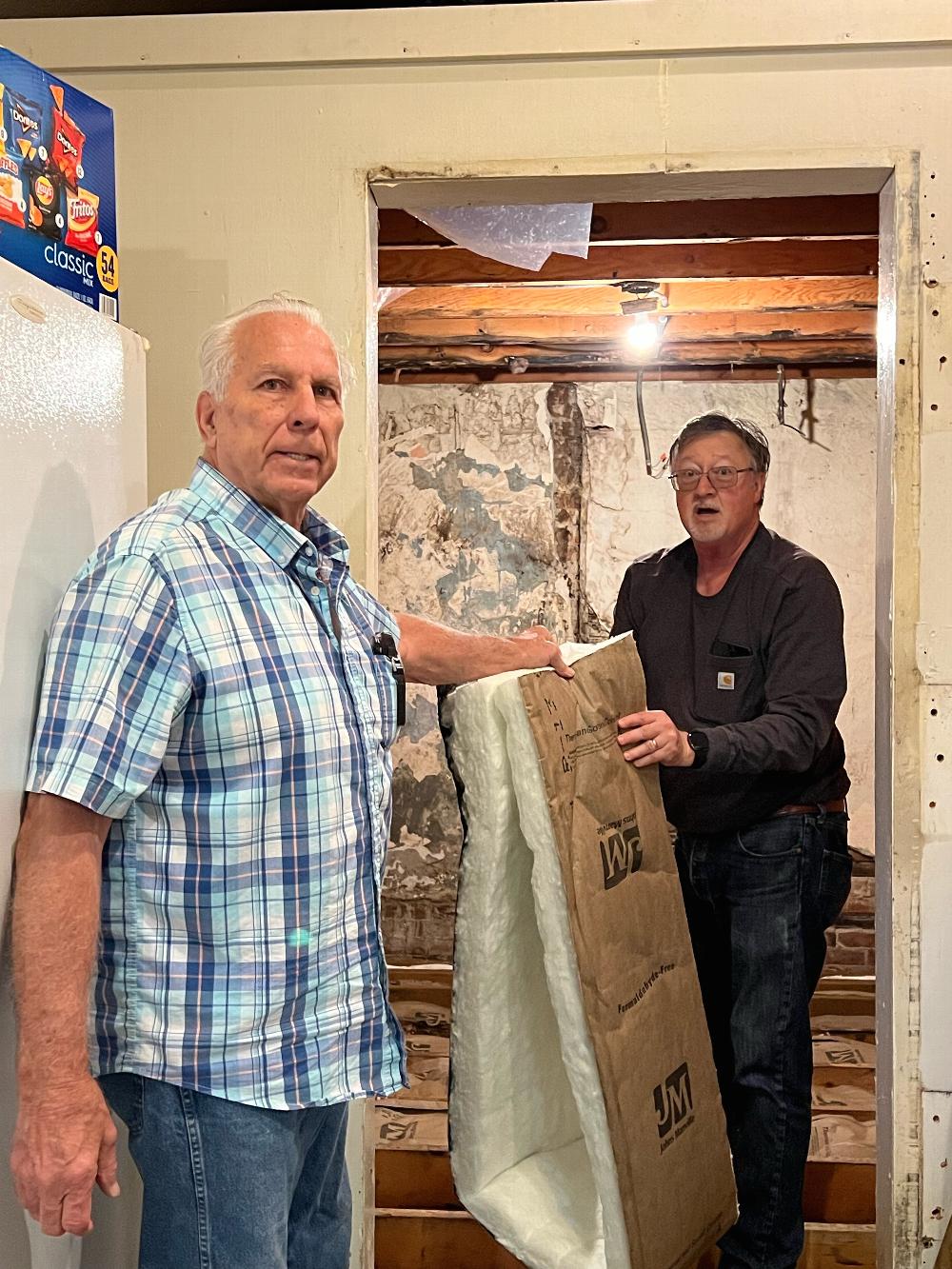 Tom & Gary installing insulation