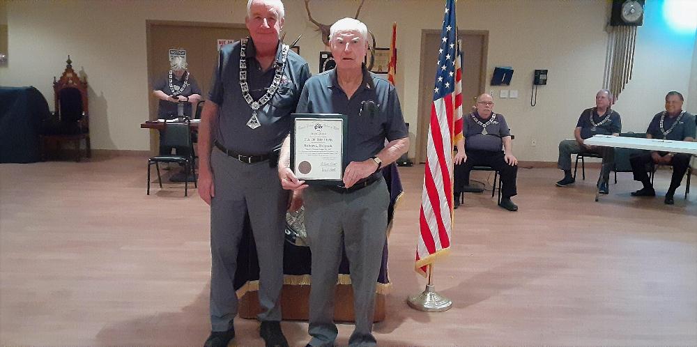 Tucson AZ Lodge #385 PER Wayne Burns presenting to Bob Holyoak the Elk of the Year award for 2021-2022.  April 12, 2022