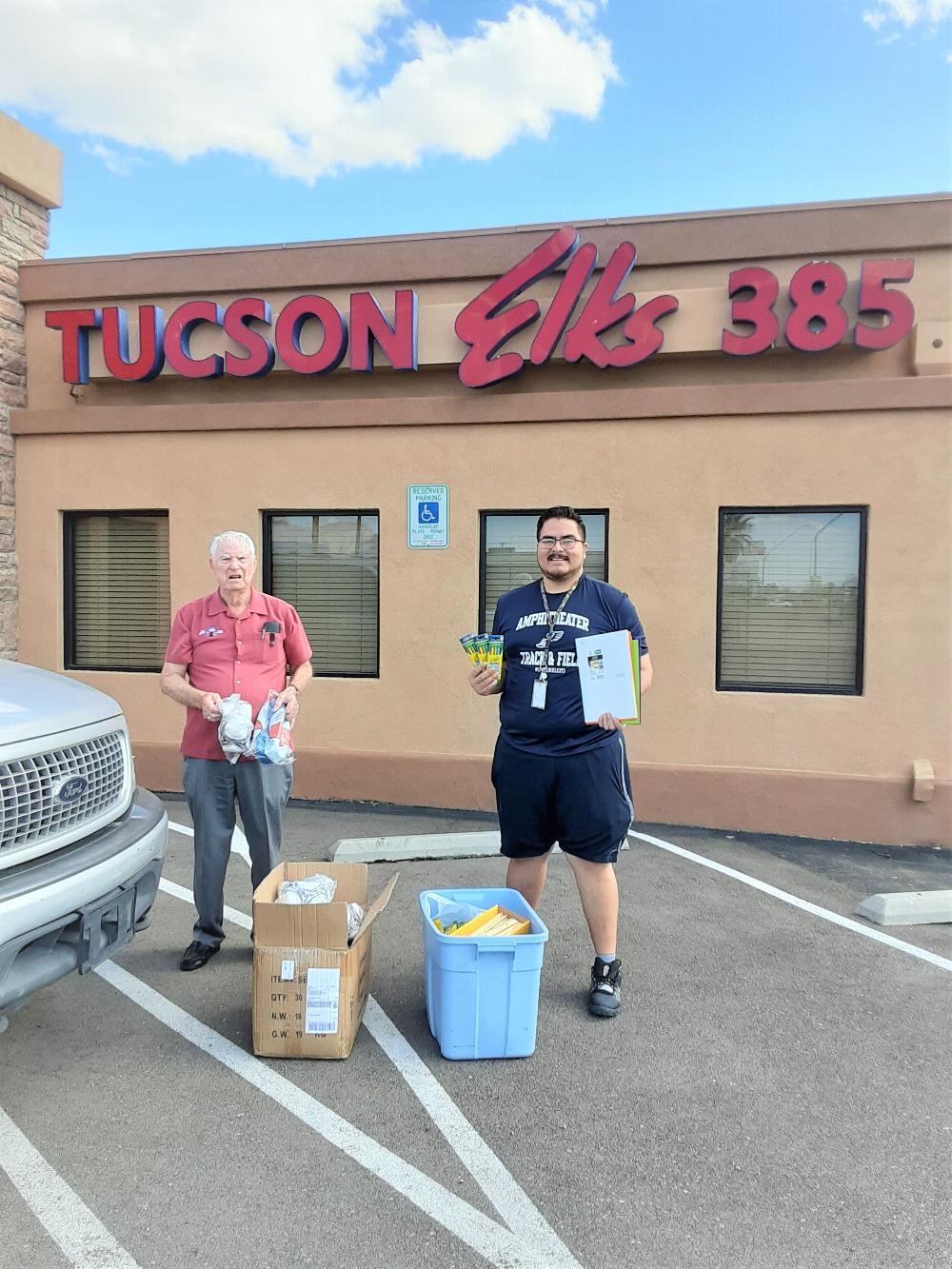 With all going on, Lodge 385 was not able to take kids to Walmart for Clothe A Child, so the lodge went to the school. Trustee/PER B. Holyoak and Mario, rep from Helen Keeling Elementary School receiving, soccer balls notebooks, other school learning related items, plus $2,500 worth of gift cards for kids Clothe A Child, made possible by the Elks Beacon Grant.   