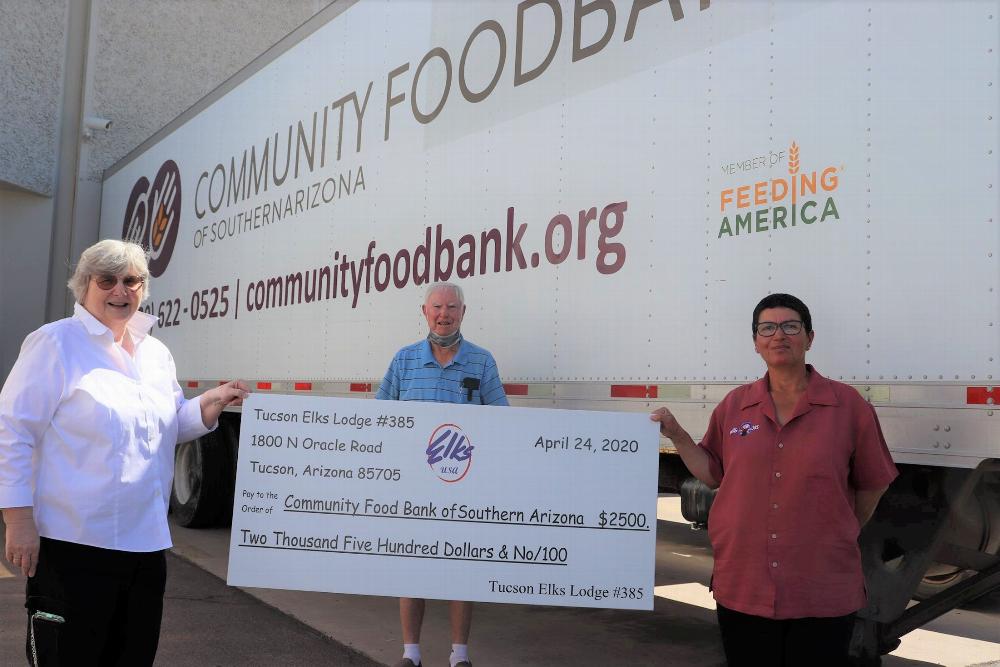 Tucson Elks Lodge 385 applied for and received a $2,500 Gratitude Grant from the National Elks Foundation and donated the monies help the Tucson Community Food Bank. Pictured April 24, 2020,  L-R, D. Gnuschke, B. Holyoak and ER M.Lopez