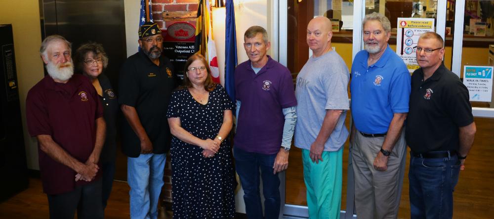 Two programs at the VA Medical Center at Martinsburg.  One is the Christmas Gift Shop-Veterans and the other is the Veterans Food Bank.  

The money went to both programs; $500 to the Christmas Gift Shop and $500 to the Veterans Food Bank, a separate check for each was made payable to Martinsburg VAVS.
Checks were presented to Seann Lindsdrom of the VA Clinic in Cumberland and hand delivered to the VA in Martinsburg by Brenda Francis.  Present were Jim Meyers, Joe Davis, Bill DeVore and Rob Rephan of Frostburg Elks 470. Commander Wesley Harper and Rebecca Brown-McCaster were present from the Frostburg American Legion. 