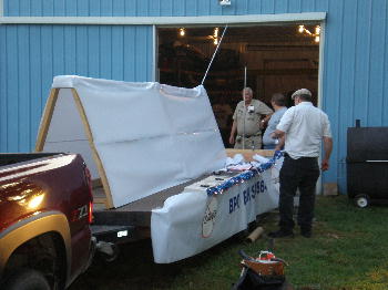 Members working on the Bushwhacker Days Float. 
Starting to look like a float.