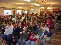 Hot chocolate and donuts weve served to all in attendance.  The banquet room was overflowing with excitement....everyone listening for Christmas bells and Santa.