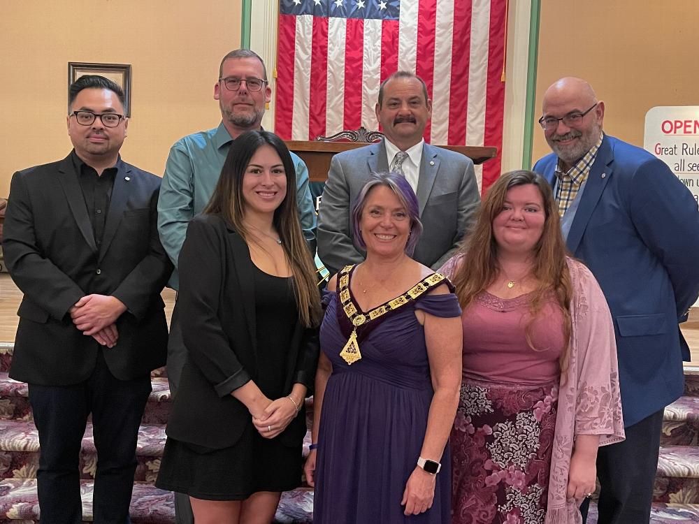 October 2022 Initiates - From Left to right: Nam Le, David Hurst, Vaugh Whalen, Eric Kaufman, Koyaana Redstar, ER Teresa Skobba and Katherine Donahue.