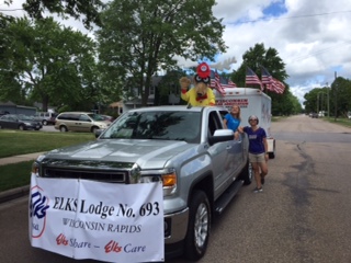 Elroy leads the Elks Drug Awareness Trailer.  Elk members hand out Rulers and Pencils urging kids to "Rule Out" Drugs.