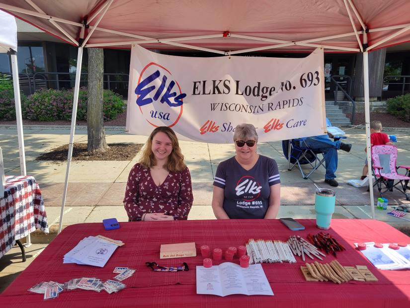 Lodge Secretary Marilyn Gillies and Daughter Morgan Gillies-Dewease helping out at the Cranberry Blossom Both