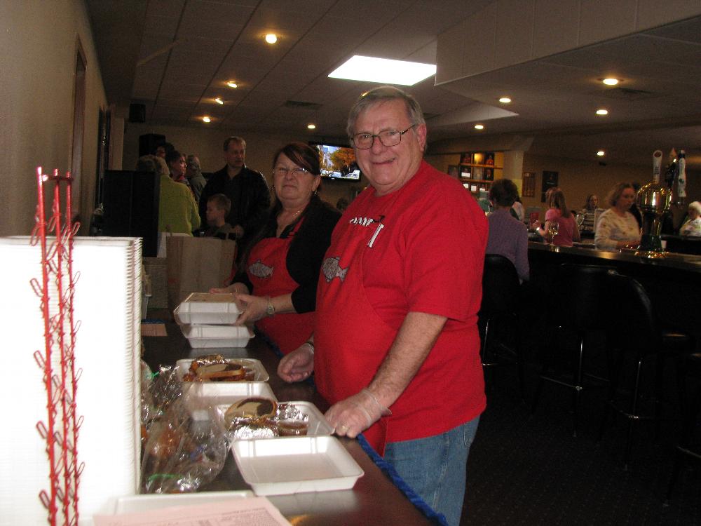 Pete Rogoski and Patty Miller prepare a delivery. 