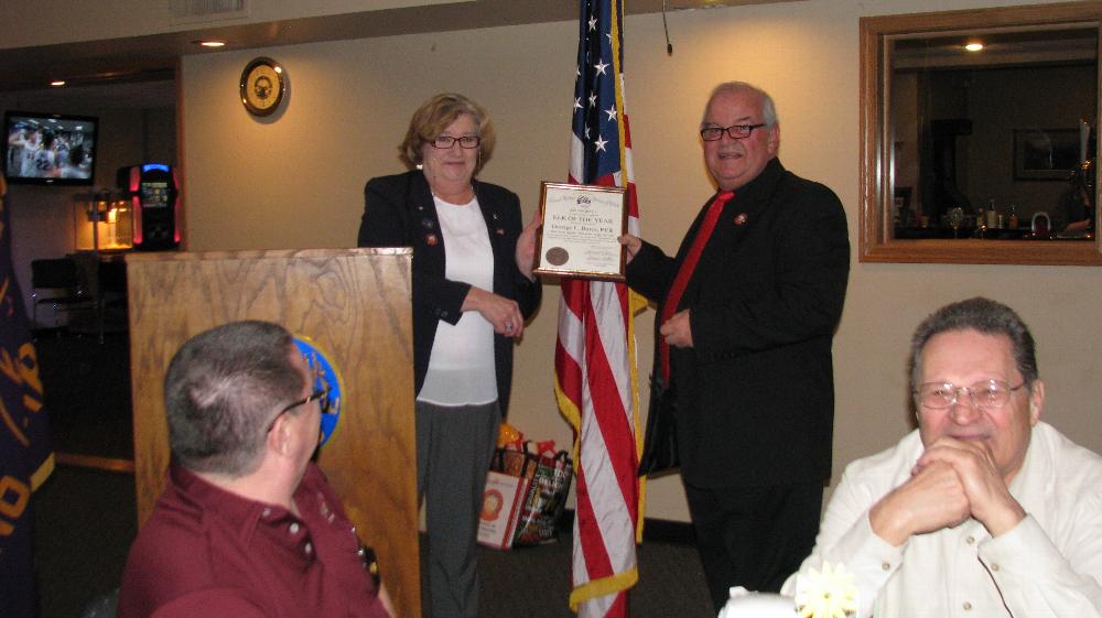 ER Marilyn Gillies presents Elk of the Year Award to George Bures