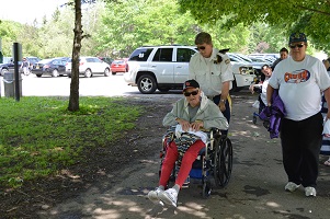 Elks and Legion Members helping with arrival of residents from local nursing homes.