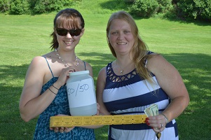 Jennifer and Savana collect and prepare for raffle.  Who could resist not buying a ticket from these two?