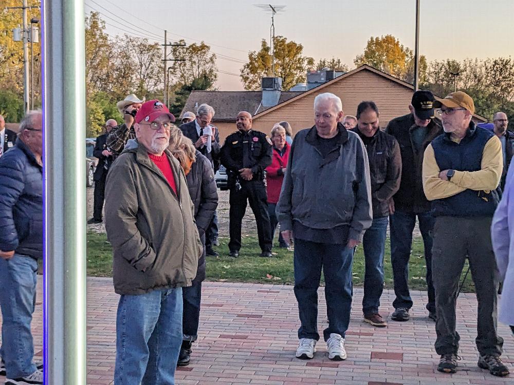 Veterans standing on their bricks.