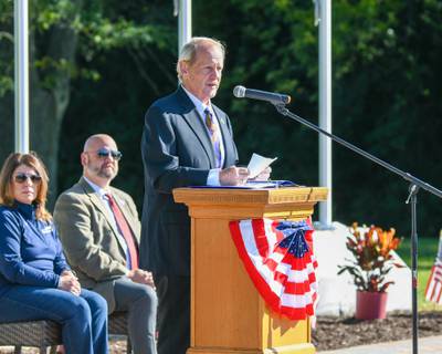 DeKalb Elk Member Michael Embrey opening the dedication ceremony.