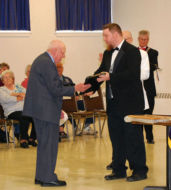 At the installation of officers for 2014-15, PER Nick MacNeil (R) presents the inaugural "Justin L. Ingersoll Jr Outstanding Elk Award" to T. Elliot Munsey for his over 40 years of dedicated service to the Lodge and to the Order.
This award was named in honor of PSP/PDDGER "Judd" Ingersol Jr, Bath PER, who passed away during this past year.