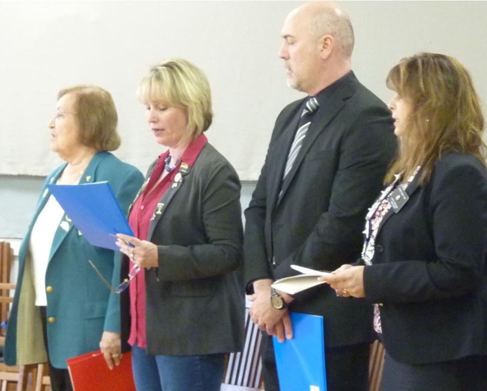 Suzanne Newswanger leading "The Star Spangled Banner"