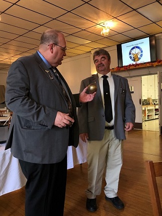 State President Brian Green presents ER Steve Gregory with a memento of his visit to the Owego Lodge.