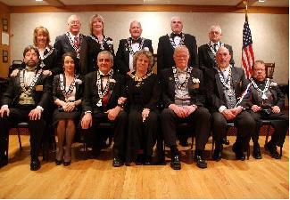 First Row:  Mark Sullivan, Treasurer, Kathy Graham, Esteemed Lecturing Knight, Cliff LeFebvre, Esteemed Loyal Knight, Laura Dickson, Exalted Ruler, Robert Murphy Jr, Esteemed Loyal Knight, Mike Mott, Esquire, Dick Tinkham, Chaplain.  Second Row:  Sue Sullivan, Tiler, Dave Rockett, Trustee, Terri Scott, Trustee, Norm Diegoli, Inner Guard, Wally Glendye, Trustee, Lester "Buzz" Darling, Trustee.  Missing from photo:  Chris Larrivey, Secretary