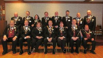 Front Row (L-R):  4 Yr Trustee, Chrmn BOD Frank Needham, Esteemed Lecturing Knight Daniel Dube, Esteemed Loyal Knight Laurie Lefebvre, Exalted Ruler Benjamin Mackiewicz Jr., Esttemed Leading Knight Terri Scott, Esquire Sean Noel, Chaplain Richard Tinkham.  Back Row (L-R):  1 Yr Trustee Al Dube, 3 Yr Trustee Charles Ledoux, Tiler Tracie Ledoux, 5 Yr Trustee Shawn O'Connor, 2 Yr Trustee Wally Glendye, Treasurer Matt Martin, Inner Guard Norm Diegoli, Secretary Chris Larrivey