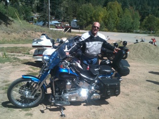 Head Trustee Jim Bradley wins the loudest pipes award for the Scouts & Scooters poker run. Was it the sound or the 6" flames coming out of his pipes?