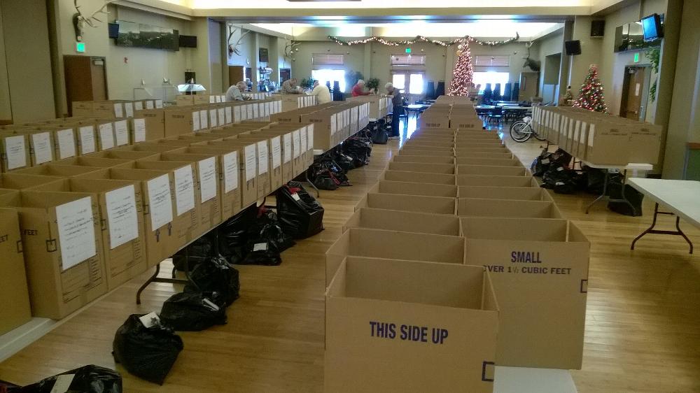 Food boxes and bags of toys ready for delivery on Christmas Eve morning.