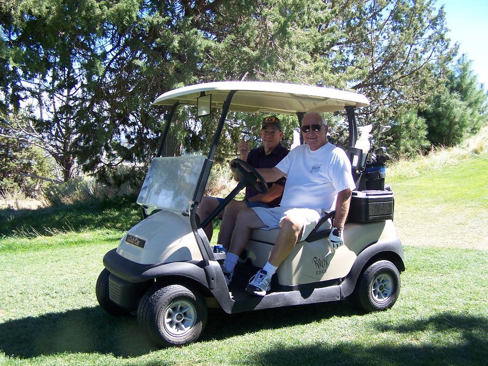 Maybe just out for a joy ride and occasionally find a golf ball to hit. Lee Thorsell & Jerry Sherman.