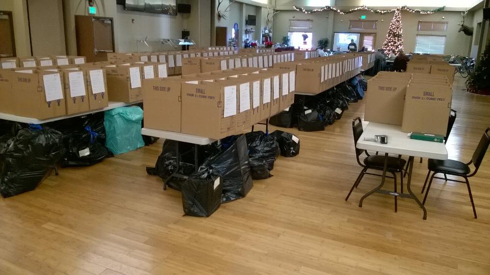 Food boxes and bags of toys waiting to be delivered on Christmas Eve morning