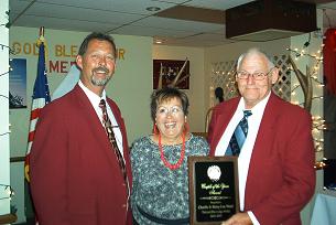 MATT PIEPER PRESENTING MARY LOU AND CHARLIE WAID WITH COUPLE OF THE YEAR AWARD