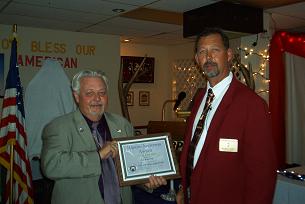 MATT PIEPER PRESENTING TOM HOPP WITH THE ROSCO ANDERSON AWARD