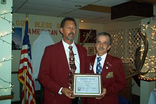 MATT PIEPER PRESENTING RICK PHELPS WITH THE CHUCK LENNON AWARD