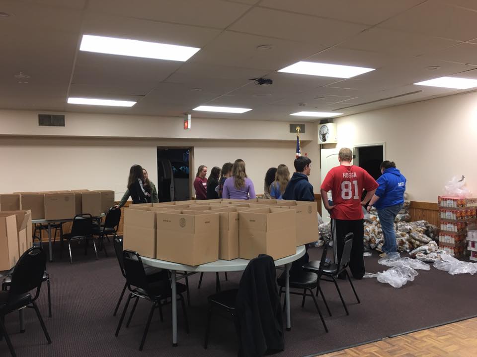 Setting up for Thanksgiving Baskets