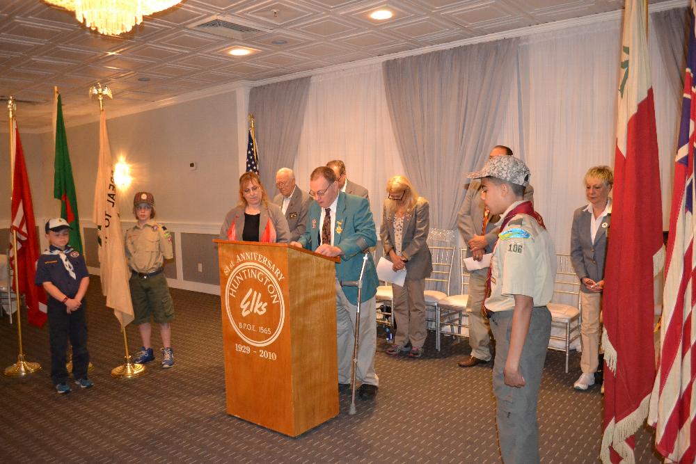 Flag Day Ceremony Huntington Lodge. PER Bill Murphy presenting a flag.