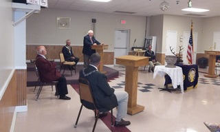 State President Jim Birdsong addresses those attending the note burning with words of praise for our Lodge.