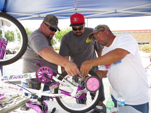 Elks members Thomas Hood (PER), Steven Perea and Chris Helbig (Inner Guard, Veterans Services), spent the majority of the event airing up tires, replacing tubes and adjusting bicycles for the kids in attendance.