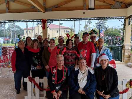 The 2018 Elks team helping Santa reward all of the good little boys and girls.