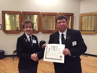 Trustee Arliss Guerrero is presented the ENF Honorary Founder Award by Exalted Ruler Bob Charleston