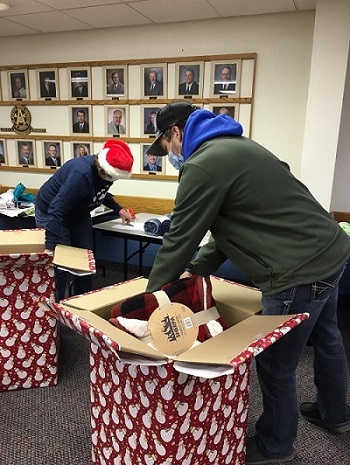 One of those helping sort donations for the 2020 Elks Veterans Stocking Stuffer project was Dalton Howe who was an Elks Legacy Scholarship recipient in 2018.