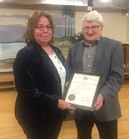 Kay Livermont of the local Flag Mountain Honor Guard-which is part of South Dakota's Quilts of Valor Foundation-was presented with the Elks Distinguished Citizenship Award. Members of the Quilts of Valor Foundation create hand made quilts of comfort and healing for veterans.  Livermont says 214,000 quilts have been given out nationwide since the program started and there are 40 quilters who are part of the Quilts of Valor program in SD.