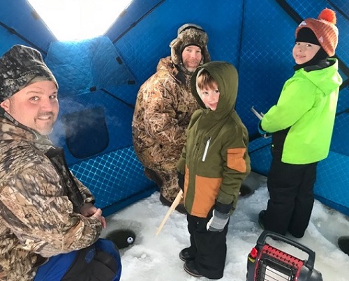 Local kids taking part in the 2019 Youth Ice Fishing event enjoyed fishing, snacks and hot cocoa.