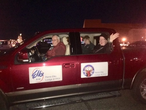 In the truck pulling the 2019 Parade of Lights float for the lodge (and tossing candy) were Dwight Pogany, Jeff Hallem and Steve Wegman.