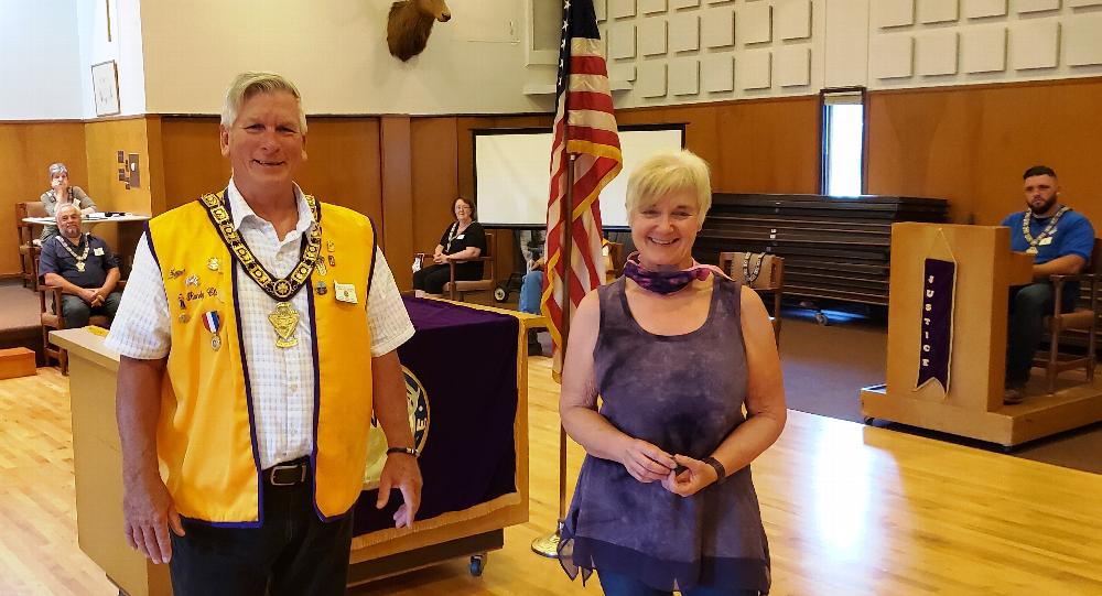 Carolyn McDermed receiving her Elk Tooth Pin