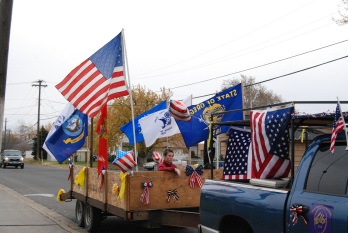 Lodge Military Flags being presented at the Veteran's Day parade. 