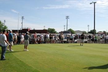 A good crowd gathers for instructions prior to tee time for the annual golf tournament for Youth Activities.