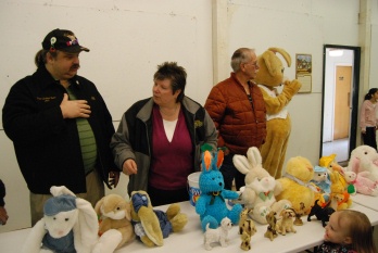 PER Jeff Shorey with Rhonda Walters and Larry Hetterley Easter Egg Hunt chairs along with the Easter Bunny and many stuffed animals to be handed out to the children. 
