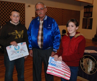 PER Larry Hetterley with local Veterans Placemat winners.