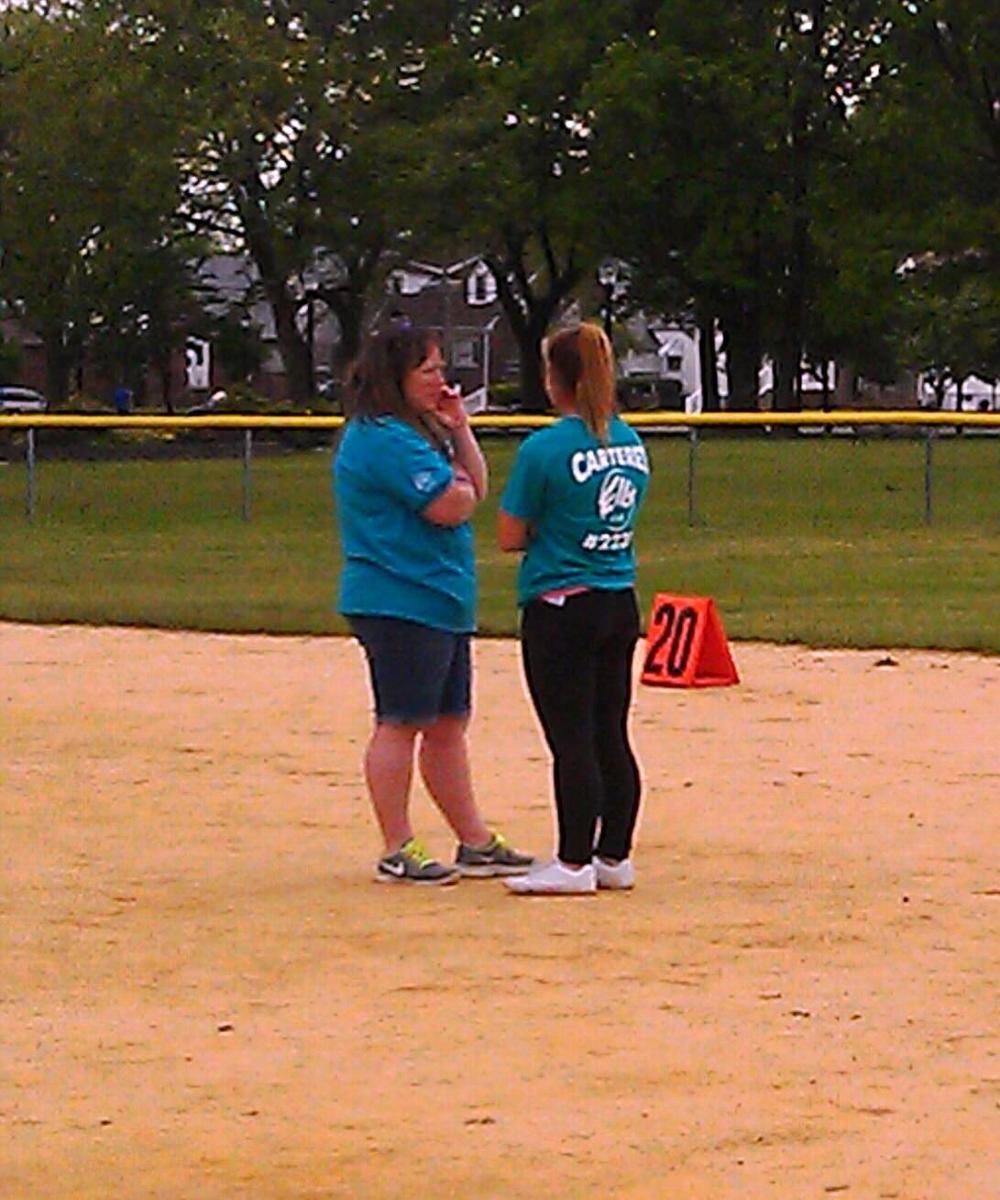 Member Kim and Antler 2nd VP Heather working batter up