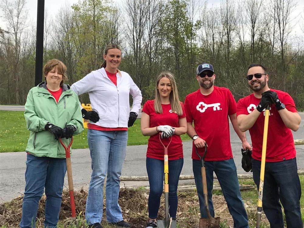 Employees of Key Bank's Fairmount office assist with gardening duties at the Lodge during Their "Neighbors Make a Difference Day". Spring 2019